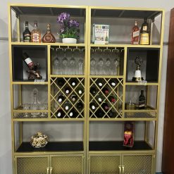 Elegant Milan Gold Bar Cabinet with double doors closed – black wood and gold metal finish