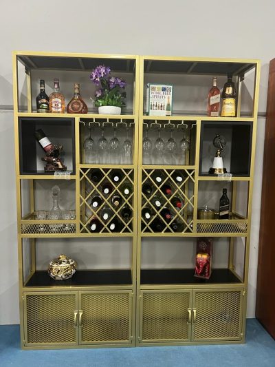 Elegant Milan Gold Bar Cabinet with double doors closed – black wood and gold metal finish