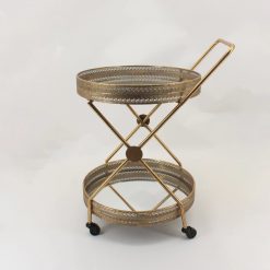 Featuring two round shelves and a stylish gold finish, this versatile serving cart is perfect for transporting drinks, appetizers, or other hors d'oeuvres around your home with ease.