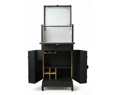 Shop the elegant Leather Bar Cabinet (Martini Trunk). Features a mirrored interior, stemware storage, and drop-down counter. Choose Black or Tan.